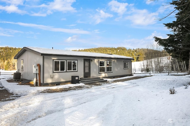 view of front of property featuring central AC unit