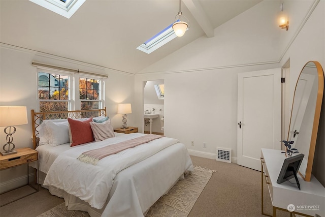 carpeted bedroom featuring vaulted ceiling with beams