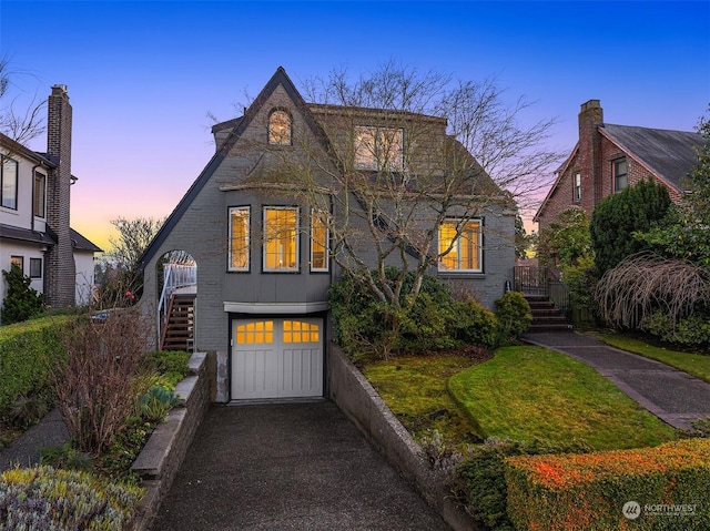 view of front of property with a garage