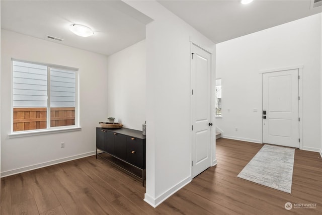 interior space with dark wood-type flooring