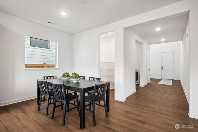 dining room featuring dark hardwood / wood-style floors