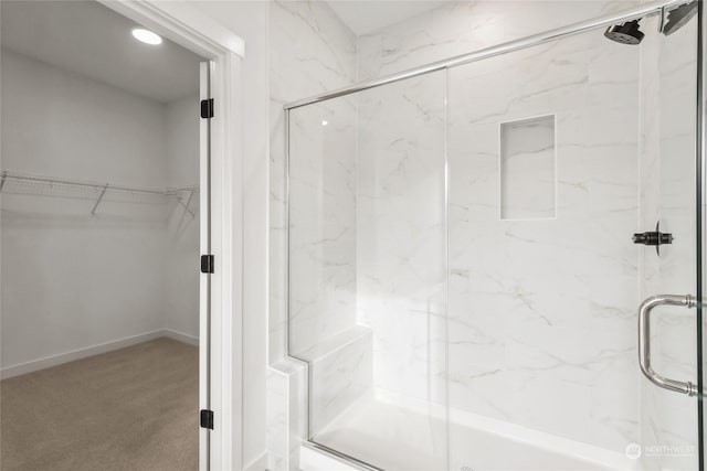 bathroom featuring an enclosed shower