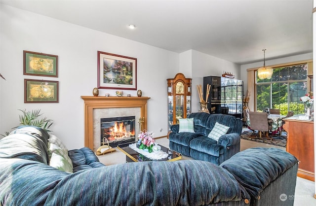 living room with a premium fireplace