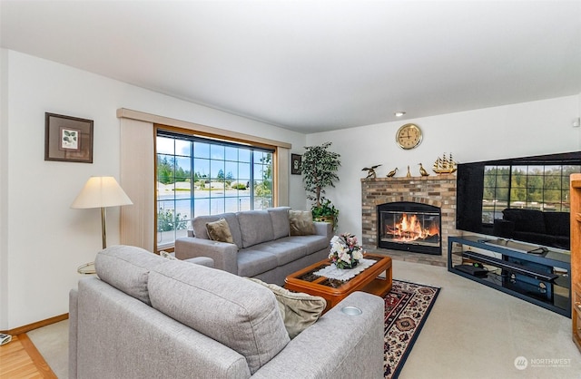 living room featuring a fireplace