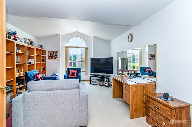 living room featuring light colored carpet and lofted ceiling