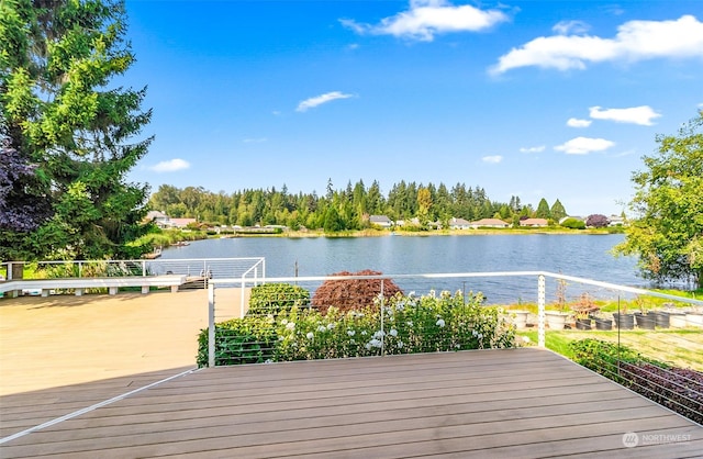 deck featuring a water view