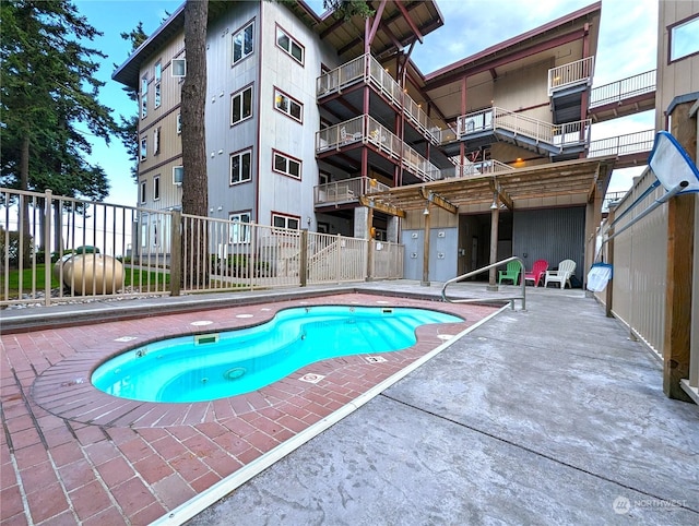 view of pool with a patio