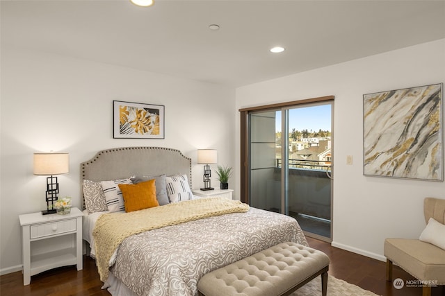 bedroom featuring access to exterior and dark wood-type flooring