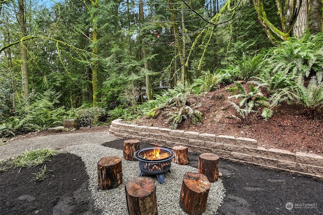 view of patio / terrace featuring a fire pit