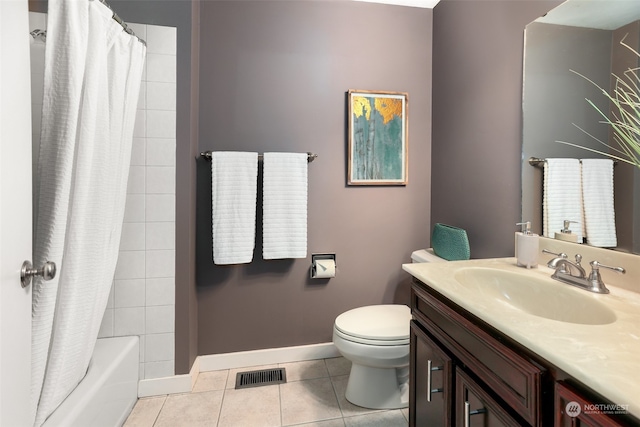 full bathroom with toilet, shower / bath combo with shower curtain, tile patterned floors, and vanity