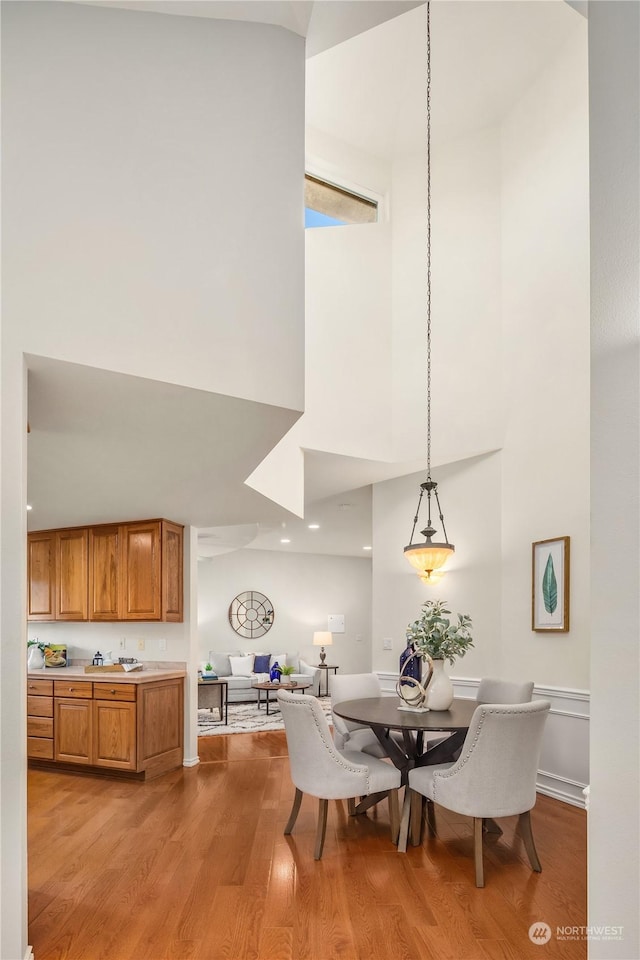 dining space featuring light hardwood / wood-style flooring