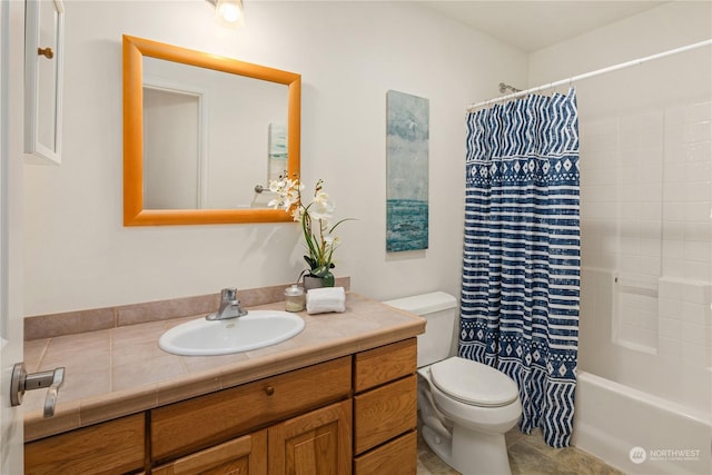 full bathroom featuring vanity, shower / tub combo, and toilet