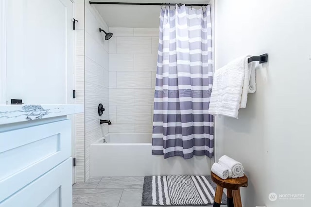 bathroom featuring shower / tub combo with curtain