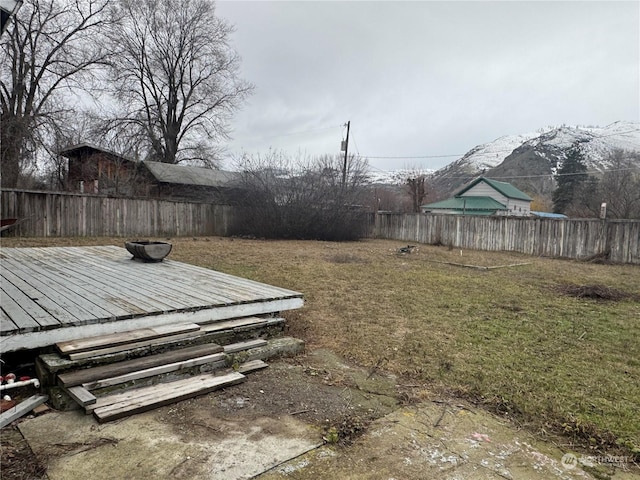 view of yard with a wooden deck