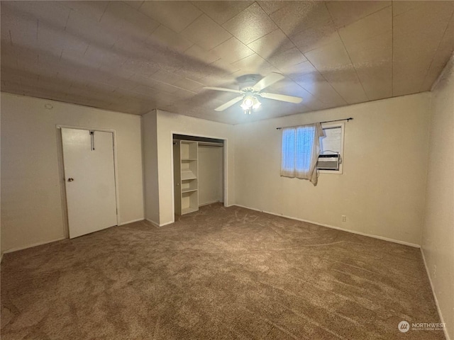 unfurnished bedroom featuring carpet, ceiling fan, and cooling unit