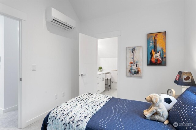 bedroom with light colored carpet and a wall unit AC