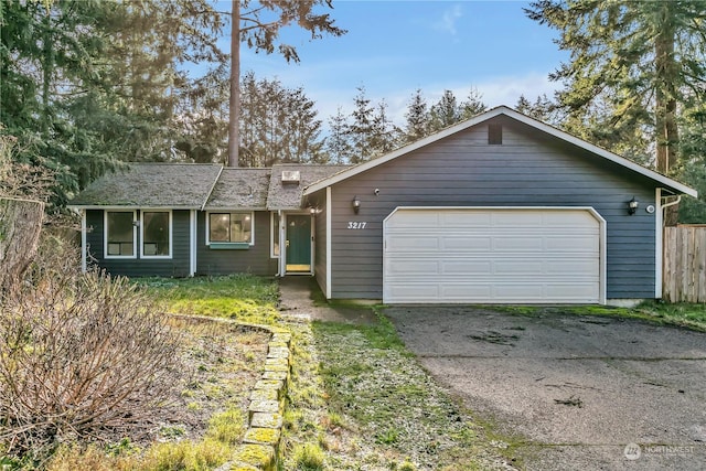 single story home with a garage