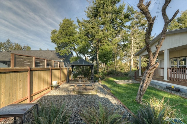 view of yard with a gazebo, a fire pit, and a patio area