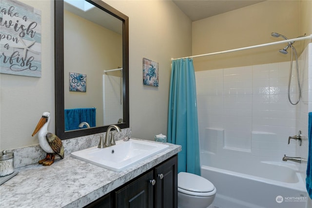 full bathroom with toilet, vanity, shower / bath combo, and a skylight