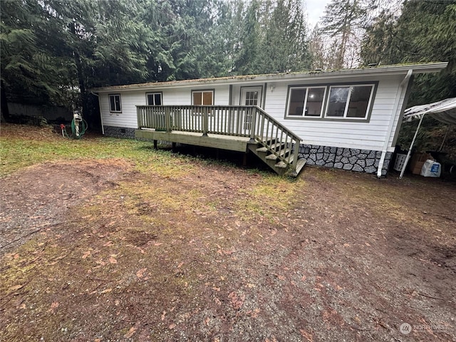 manufactured / mobile home featuring a deck