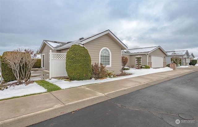 view of front of property with a garage