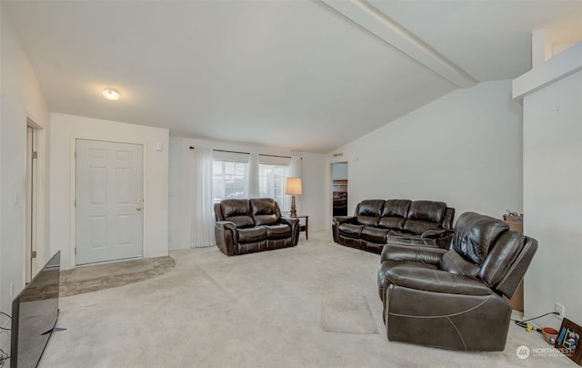 living room with carpet flooring and lofted ceiling with beams