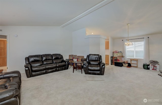 carpeted living room with lofted ceiling and a chandelier