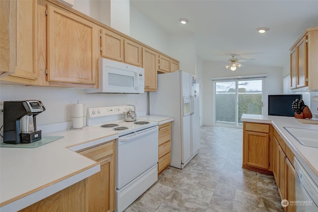 kitchen with light brown cabinets, white appliances, ceiling fan, and sink