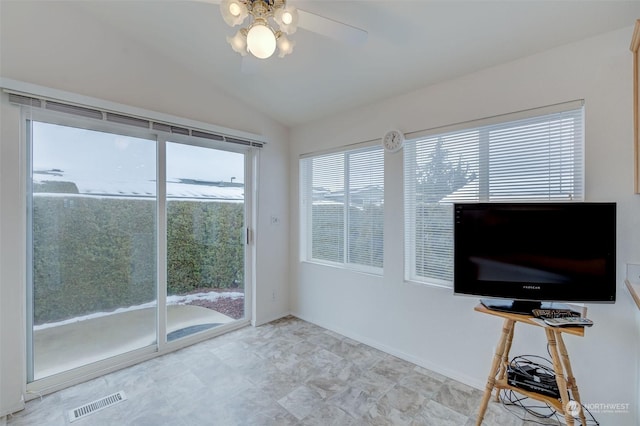 sunroom / solarium with vaulted ceiling and ceiling fan