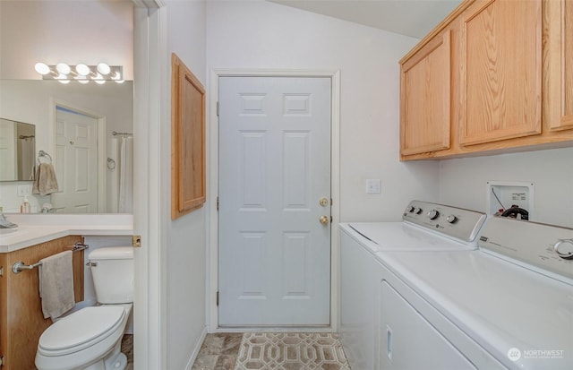 laundry room with separate washer and dryer