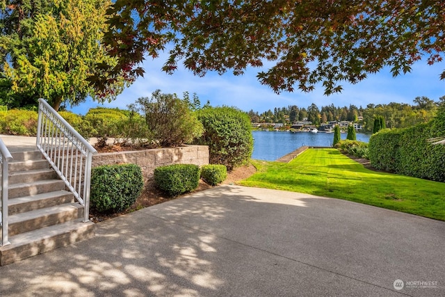 view of patio / terrace featuring a water view