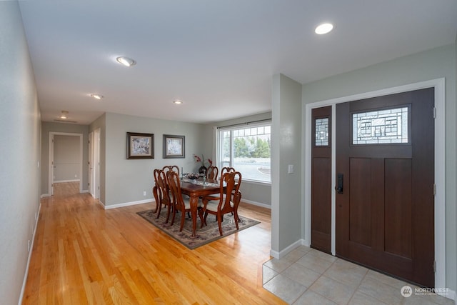 entryway with light hardwood / wood-style flooring