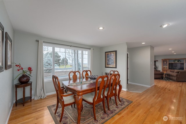 dining room with light hardwood / wood-style flooring