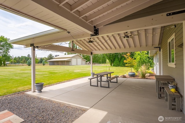 20094 Delta Rd NW, Soap Lake, WA 98851 - view of patio / terrace featuring a ceiling fan and an outdoor structure