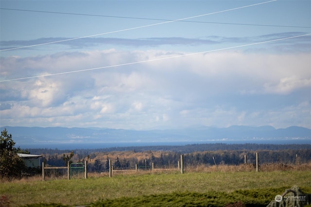 property view of mountains featuring a rural view