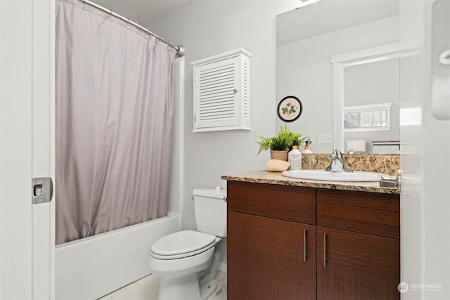 full bathroom featuring shower / bath combination with curtain, vanity, and toilet