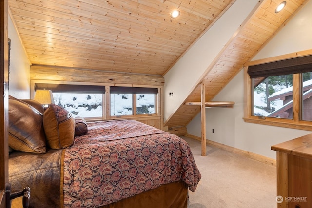 carpeted bedroom featuring wood ceiling and lofted ceiling