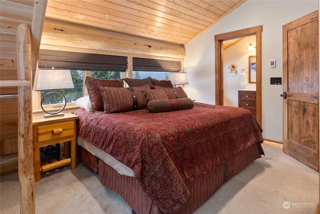 bedroom with lofted ceiling, light colored carpet, and wood ceiling