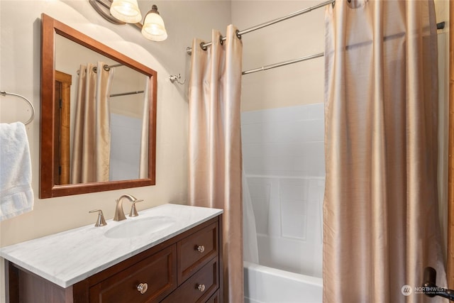 bathroom with vanity and shower / bathtub combination with curtain