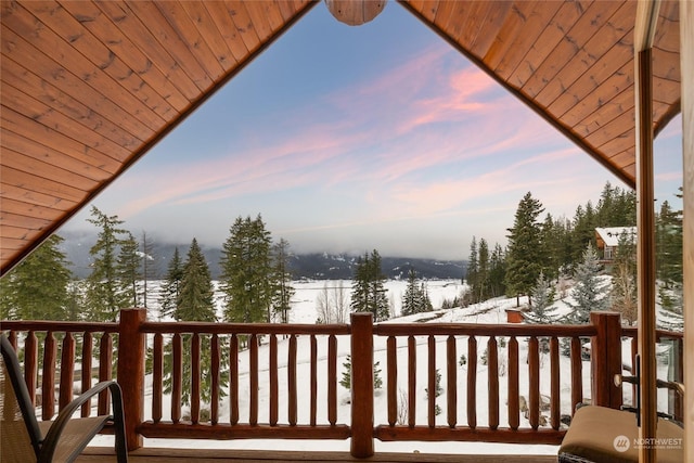 view of snow covered deck