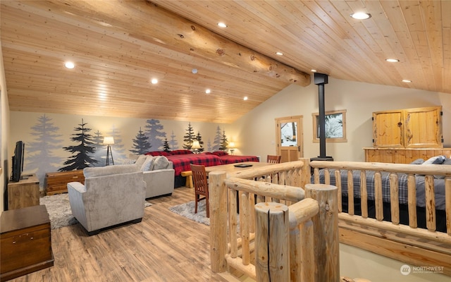 living room featuring wood ceiling, lofted ceiling with beams, and hardwood / wood-style flooring