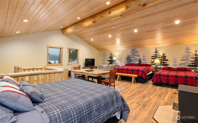 bedroom featuring lofted ceiling with beams, light wood-type flooring, and wooden ceiling