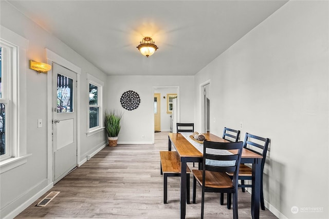 dining room featuring light wood-type flooring