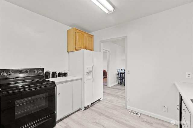 kitchen featuring light wood-type flooring, black range with electric stovetop, and white fridge with ice dispenser