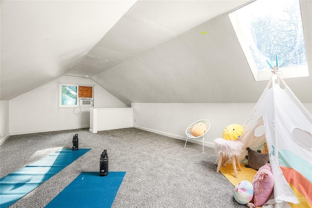 recreation room featuring carpet, lofted ceiling, and cooling unit