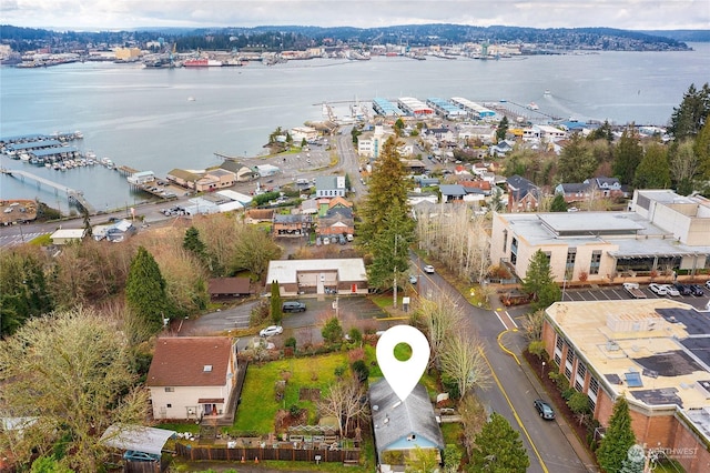 birds eye view of property featuring a water view