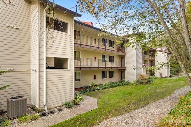 view of building exterior featuring central AC unit