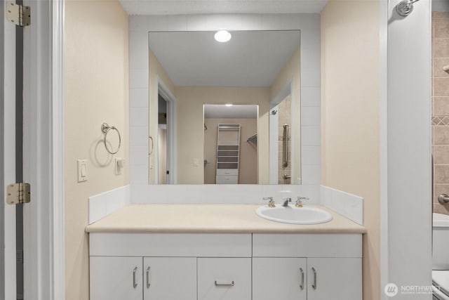 908 E Bay Dr NE Unit 203, Olympia, WA 98506 - bathroom featuring a shower and vanity