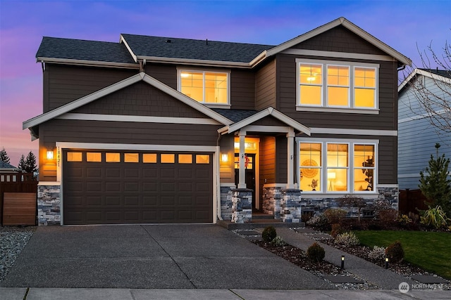 craftsman house with a garage