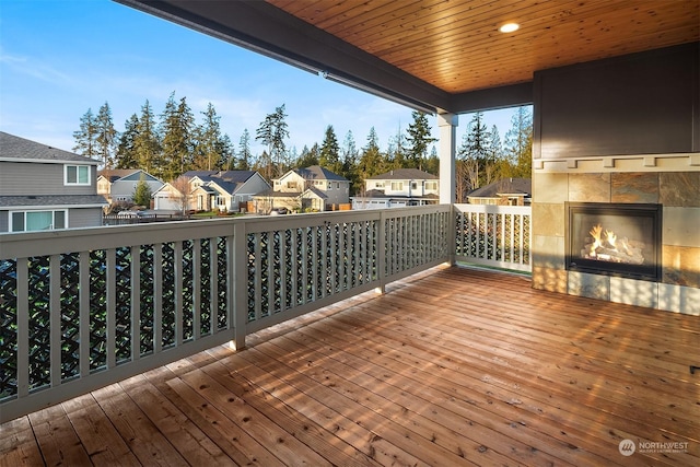 deck featuring a tile fireplace